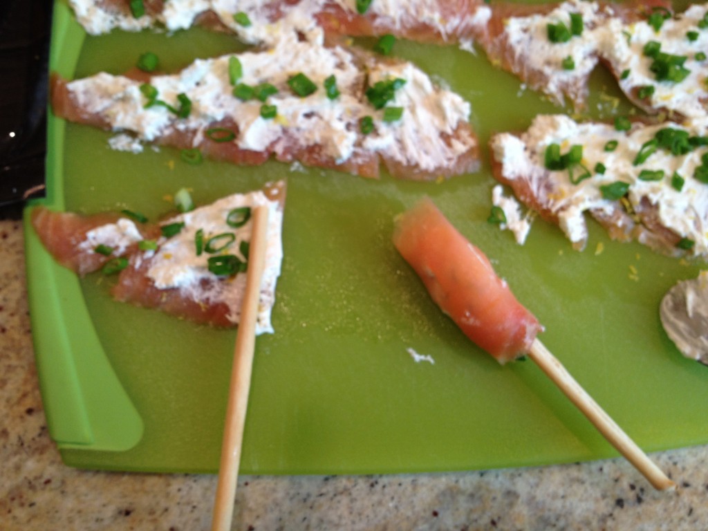 roll salmon around breadstick