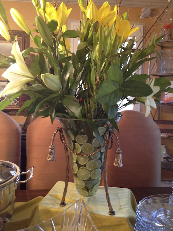 sliced limes lining glass vase