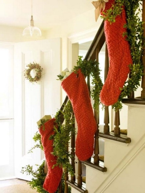 Pretty Christmas Staircases | If you don't have a fireplace to hang your stockings, the stairs are a nice alternative. 