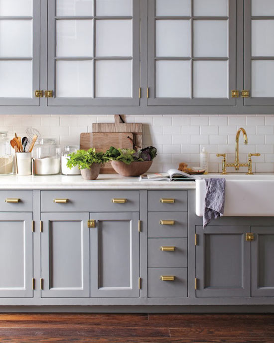 Gray cabinets with brass hardware