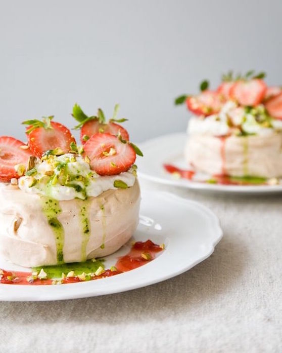 Oh my!  These Meringues with Strawberries, Vanilla Cream and Basil Coulis are almost too pretty to eat!  This elegant dessert is the perfect ending to a summer dinner party.