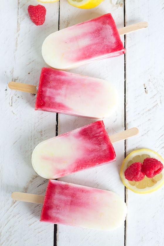 Kick off Summer with these 10 Gourmet Popsicle Recipes | Raspberry Lemonade Yogurt Popsicles