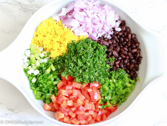 One of our summer favorites! This Confetti Rice Salad is full of healthy and fresh ingredients and oh so delicious! 