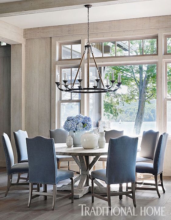 Lovely dining room with round table found at Traditional Home