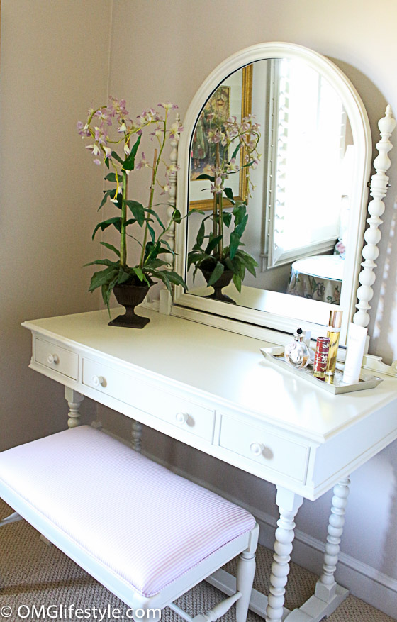 Painted furniture - this vanity went from dark antique wood to cream