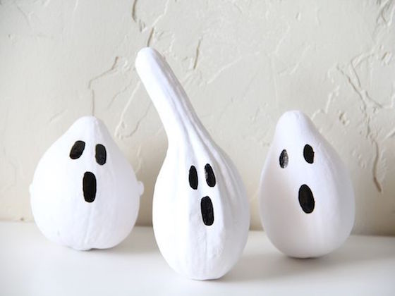 Gourds painted as ghosts for Halloween
