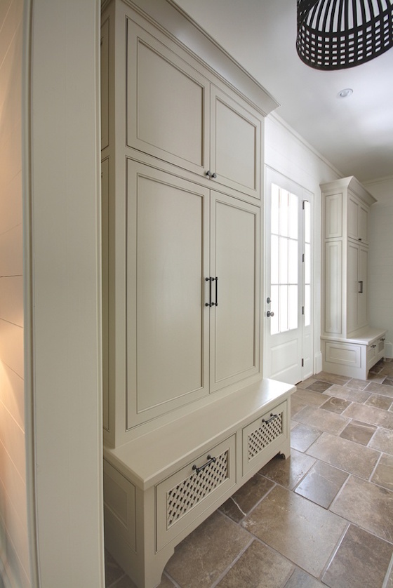 Mudroom with built in cabinets and benches