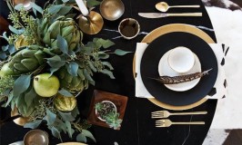 Love this dark tablecloth with the gold accessories