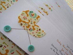 Baby Shower Invites - Adorable baby carriage with buttons as wheels