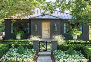 Smaller homes are so charming. Charcoal gray painted brick ranch.